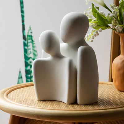 China Modern Minimalist Ceramic Couple Art Home Decoration Bedroom Valentine's Day Craft Decoration for sale