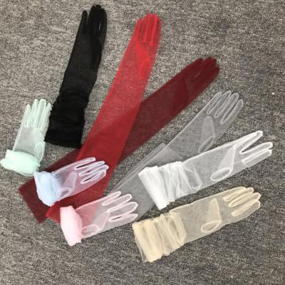 China 2021 Long Full Tulle Long Sheer Gloves Wedding Bride Gloves Fashion Solid Color Transparent Ultra Thin Mitten Bridal Elbow Long Gloves for sale