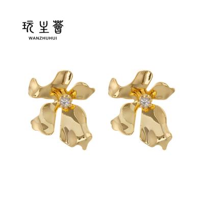 China CLASSIC flower earrings copper plated with gold petal earrings geometric fashionable earrings women for sale