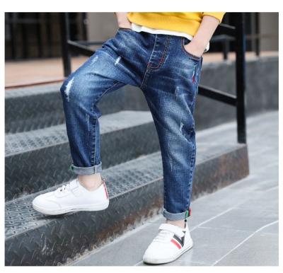 China New Design Windproof Waist Kids Boy Jeans Blue Loose Elastic Pants for sale