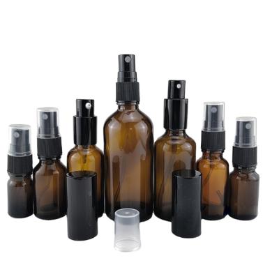 China Free Sample Personal Care Amber Glass Spray Bottles With Sprayer For Cosmetic Essential Oil 30Ml 50Ml 100Ml for sale