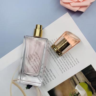 China Customized Cosmetic Perfume Bottles 50ml Glass Colored Stock Empty Perfume Glass Spray Bottle for sale