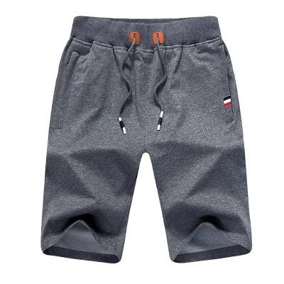 China Anti-wrinkle men's fashion running shorts drawstring casual cotton zipper canvas pockets sport shorts elastic waist beach gym shorts for sale