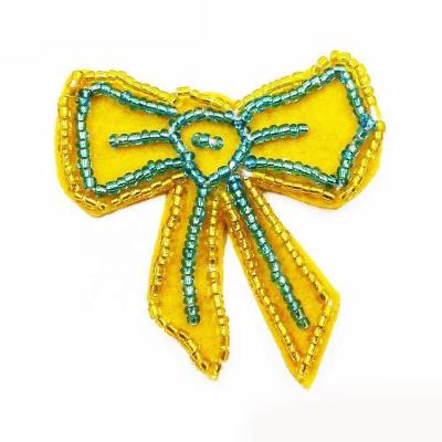 China Wholesale High Quality Handmade Beaded Trims Bag Accessories Women Shoes Accessories Yellow Bow Beaded Appliques for sale