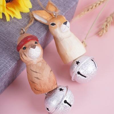 China Minimalist Animal Hanging Bell Hand Carved Painted Wooden Decor Christmas Tree Ornaments for sale