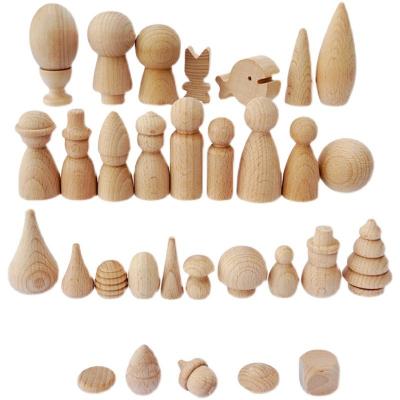 China Educational DIY Toys Unfinished DIY Creative Set of Peg Toy People Family Doll Bodies 32pcs Solid Wood Toys for sale