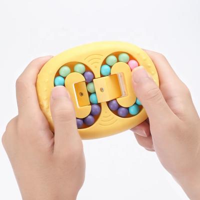 China DIY Educational Toys Spinning Fingers Spinning Bean Decompression Spinning Bead Fingertip Rotating Magic Top Cube Toy Educational Toys for Kids for sale