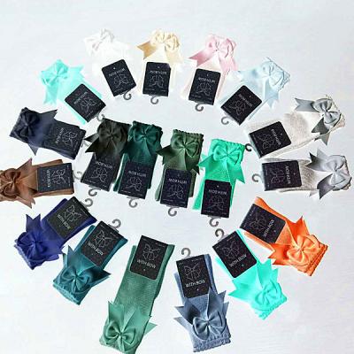 China Breathable Quick Drive Volume 0-8 Years Old Cute Baby Knee High Children Socks With Bow for sale