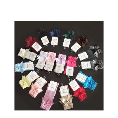 China Size 0 Mon-8Y Breathable Cute Baby Knee High Bow Socks Baby Socks With Bow for sale