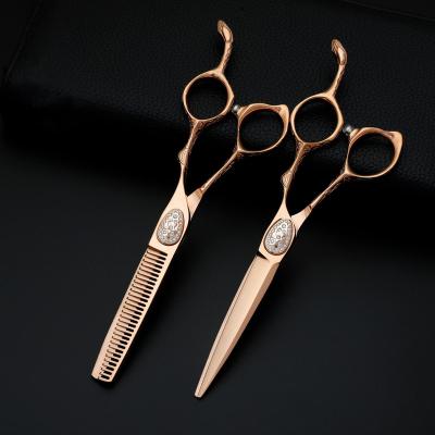 China Hair Cutting New Rose Golden Coated 6 Inch Barber Hair Scissors Good Quality Scissors for sale