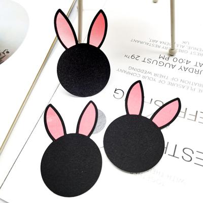 China Comfortable Sexy Women Black And Pink Colors Rabbit Shape Comfortable Satin Cloth Disposable Nipple Cover for sale