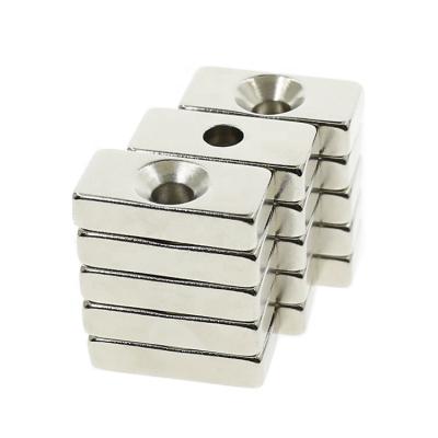 China Industrial Magnet Milled Block Neodymium Magnet With One Drilling for sale