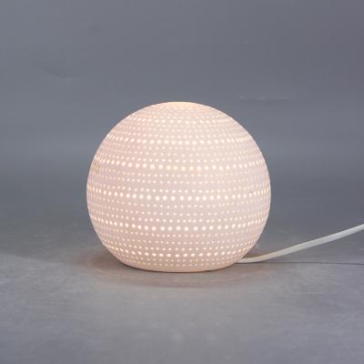 China Classic Modern Ceramic Led Night Light Geometric Bedside Table Lamp Craft Kids Night Light Lamp For Bedroom for sale