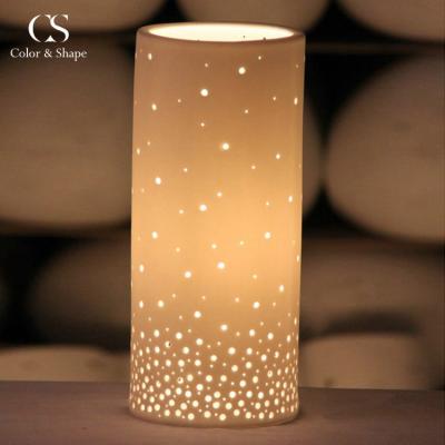 China Modern Warm Creative Night Light Hollow Out Cylinder Porcelain Bed Side Night Light for sale