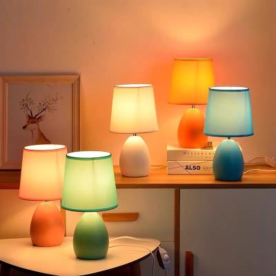 China Modern Simple Electric Nordic Simple Home Decor Bedside Tables End Desk Lamp Ceramic Oval Ceramic Oval Light Desk Lamp for sale