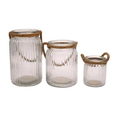 China Garden traditional clear decorative glass candle holder ppant jar with hemp rope handle for sale