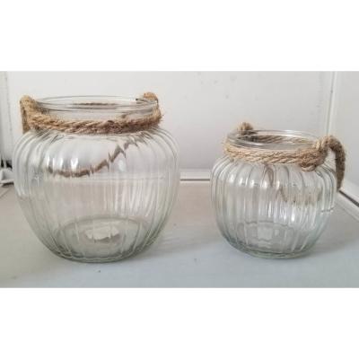 China Traditional clear garden candle holder decorative glass jar with hemp rope handle for sale