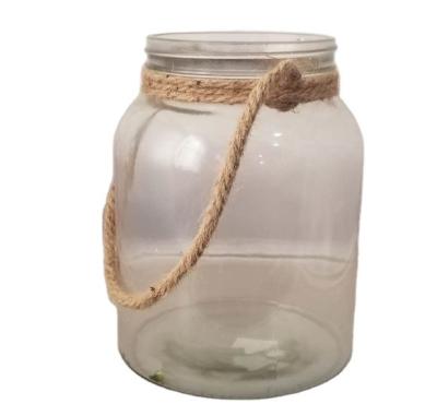 China Traditional clear garden candle holder decorative glass jar with hemp rope handle for sale