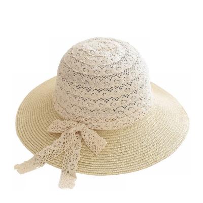 China 2022 Summer New Lady Straw Hat Lace Bowknot Bucket Hat Striped Beach Vacation Female Sun Hat for sale