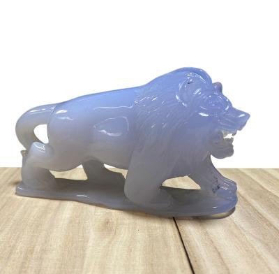 China Art Natural chalcedony folk blue lion carving crafts hand cut lion gemstone carving decorative figurine for sale