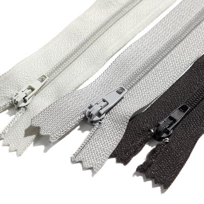 China Wholesale Invisible Long Chain Fabric Resin Zipper Roll Eco-friendly Zipper For Clothing Bags Zipper for sale