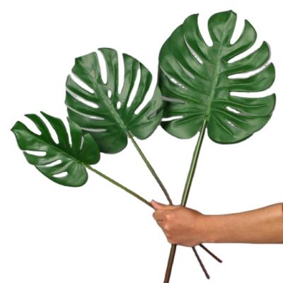 China Natural Direct Plant Touch Artificial Green Leaf Plants Artificial Monstera Leaves For Party Decor for sale