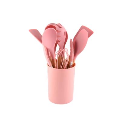 China Minimalist Strong And Sturdy Pink Soft Silicone Kitchen Utensils Silicone Handle Kitchen Accessories Widely Used Wooden Kitchenware for sale