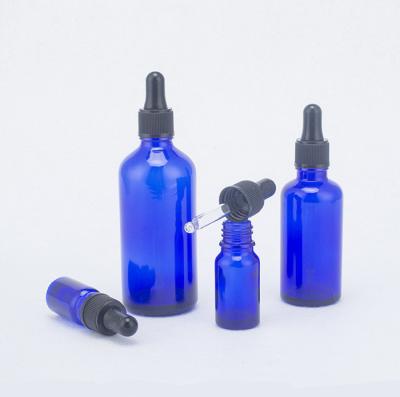 China Blue personal care classic round essential oil glass bottle with cap and dropper for sale