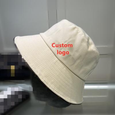 China Wholesale Reversible Custom Logo Full PC Hand Body Print Fashion Designer And Embroidered Fisherman Bucket Hat With Own Custom Logo for sale