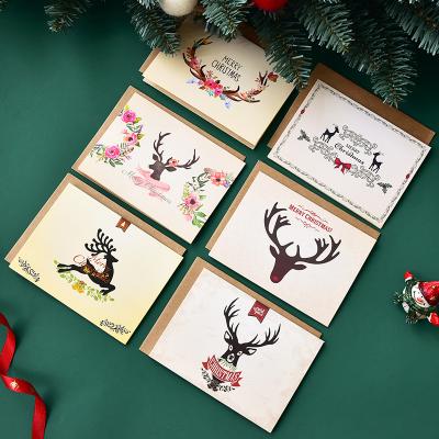 China Custom Printing Europe Kraft Paper Envelope Merry Christmas Fold Greeting Cards for sale