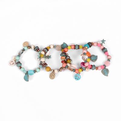 China Desgin New CLASSIC Iridescent Cheapest Plastic Beads Elastic Bracelet Bohemian Bracelet for sale