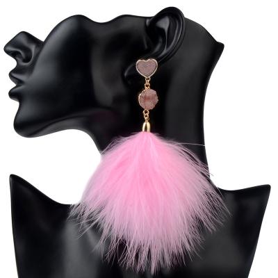 China Hot Selling Environmentally Friendly Bohemian Style Tassel Women's Ethnic Earrings Long Fashion Vintage Feather Tassel Earrings for sale