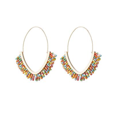 China Environmentally Friendly Fashion Colorful Bead Earrings Wholesale V Alloy Rice Bead Bohemian Earrings for sale