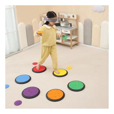 China Factory Sale Plastic Colorful Tactile Sensory Discs Tactile Dish Balance Sticky Person Toys Sensory Progression Stone For Kids for sale