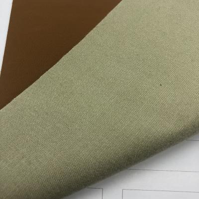 China Waterproof Hot Selling Product 0.7mm Thickness PU Leather Living Room Sofa Leather Fabric for sale