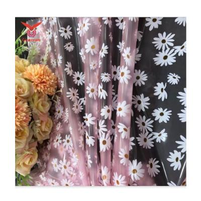 China 100% TPU waterproof wholesale transparent 0.15-0.30mm flowers printed fabric and textile for raincoat for sale