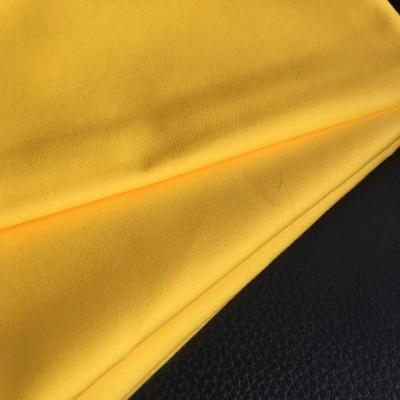 China Waterproof Bright Yellow Color Cotton Nylon Spandex Fabric For Spring And Autumn Outdoor Trench Coats for sale