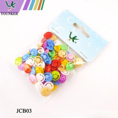 China Plastic Multicolor Round Face Dry Cleaning Smile Face Buttons Custom Sewing Round Buttons for sale