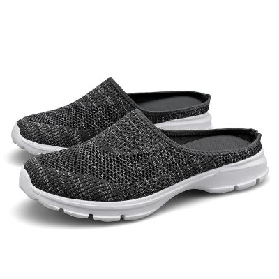 China Outdoor portable sports slippers of the large non-slip breathable beach fashion lovers men's fashion trend fly hollow shoes semi-clog weaving for sale