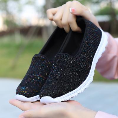 China Ultralight Flat Lady Casual Breathable Flats Fly Mesh Mother Woven Large Size Slip-on Shoe for Women Outdoor Shoes for sale