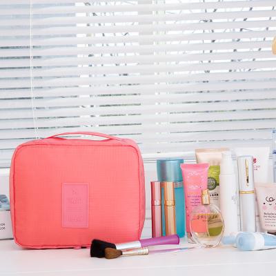 China Fashion Wholesale Fashion Polyester Makeup Travel Cosmetic Boxes Wash Travel Storage Pouch Bag for sale