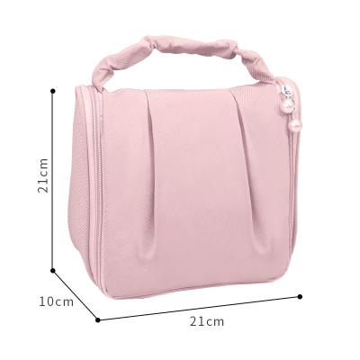 China Korean fashion cosmetic bag with zipper travel triangle with large capacity polyester cotton cosmetic makeup bag for sale