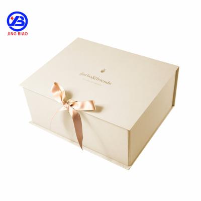 China Custom Flat Folding Magnetic Luxury Empty Gift Boxes Handmade Hard Cardboard Packaging Gift Box With Ribbon Closure For Clothes for sale