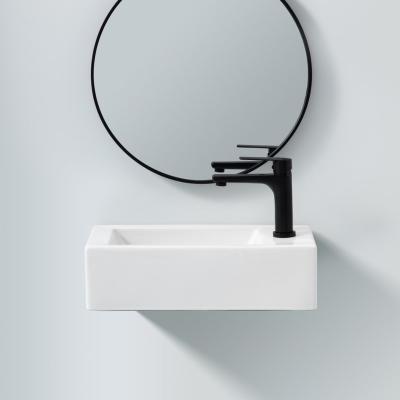 China Home Design Unique Glossy White Bathroom Sinks Waterproof Good Quality Space Saving Design Hotel Ceramic One Piece Wall Hung Basin For Sale for sale