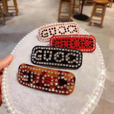 China Yingchao 2022 Fashion Hot Selling Luxury Letter Crystal Rhinestone Zodiac Week Bobby Pin Hairclip For Women Accessories for sale