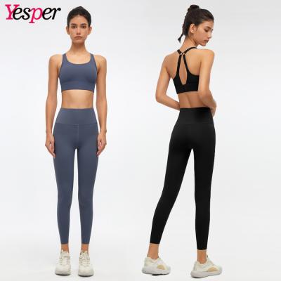 China Breathable two-piece workout set women sports vest ladies yoga set women gym yoga sports bra and leggings sets for sale