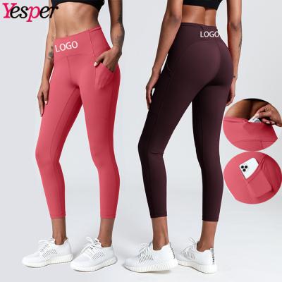 China Customs Breathable 2 In 1 Women Yoga Leggings High Waist Pocket Yoga Tight Pants for sale