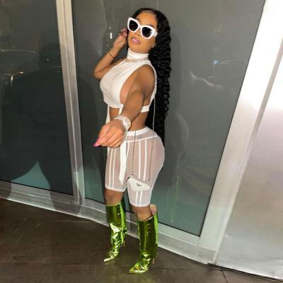 China Y2K Viable Fashion Hot Summer 2 Pcs Sexy Club Outfits Bandage See Through Hollow White Casual Two Piece Short Pants Set Women Lady for sale