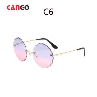 China Kids Sunglasses Promotion Sun Glasses For Kids PC Frame Custom Kids Round Frame Metal Flower Child Sunglasses for sale