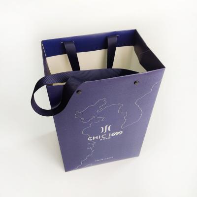 China Recycled Materials Luxury Customize Custom Logo Wine Paper Bag Luxury Bag Paper With Ribbon Custom Print for sale